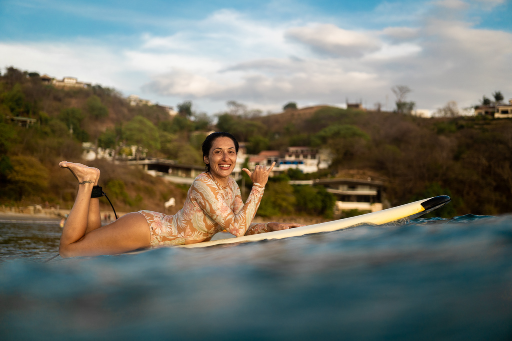 Surfer enjoying the water at Remanso Beach, Nicaragua